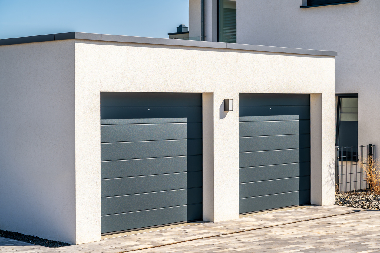 transform-your-outdoors-with-stylish-garage-door-awning-choices