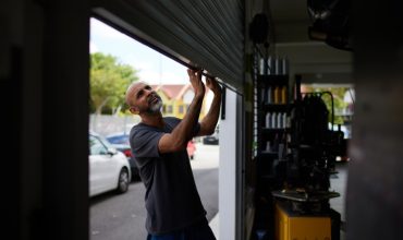 When to Choose Between Garage Door Repair and Replacement